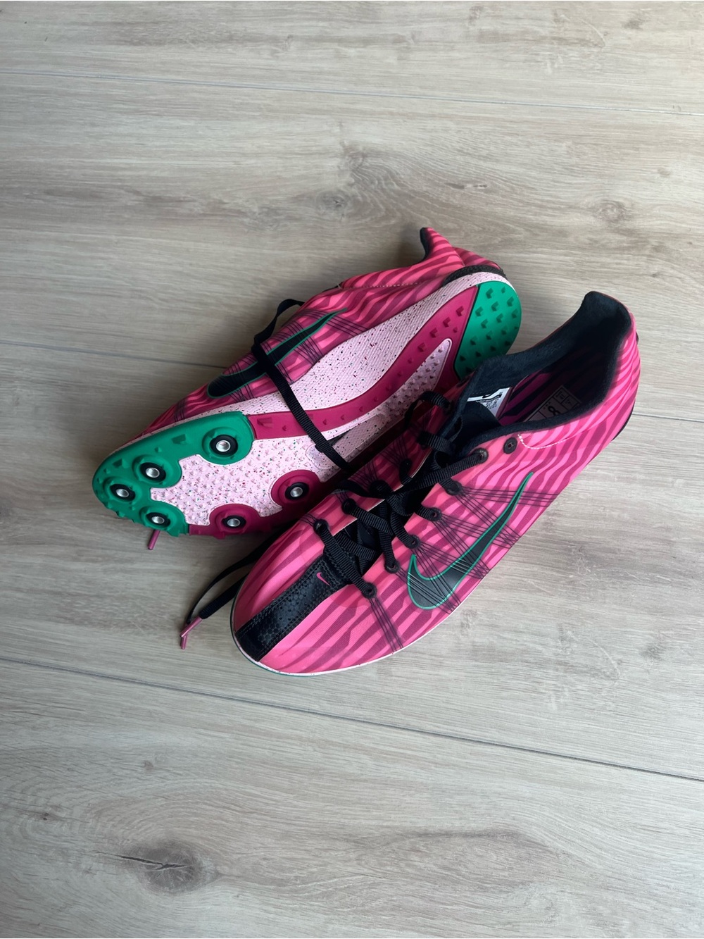 Nike Women’s track shoes, size 8, no spikes, like new.